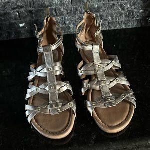 Clark’s gold sandals, back zipper, size 8, never worn.